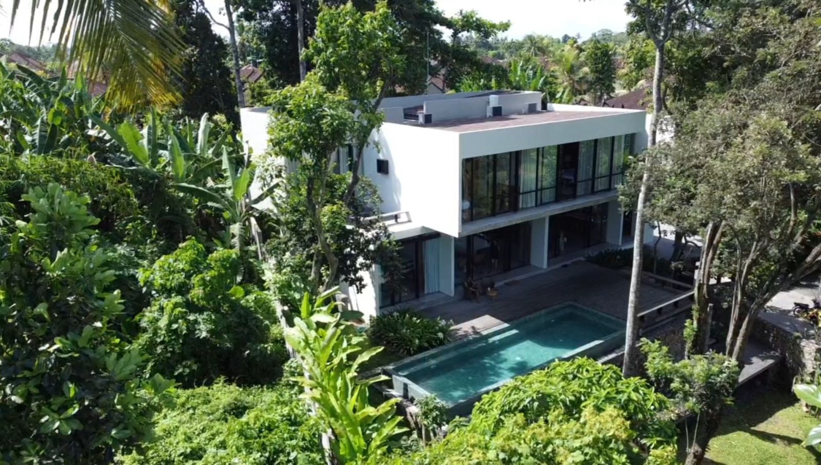 MODERN TROPICAL HOME PERCHED IN VALLEY